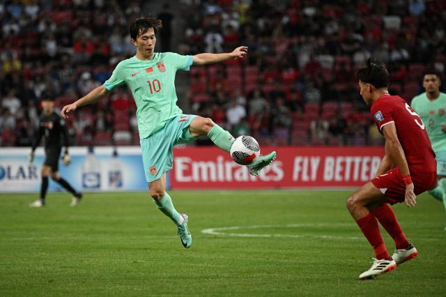 华体会官方资源-马德兴:菱形中场削弱国足防守 伊万从保守到冒进